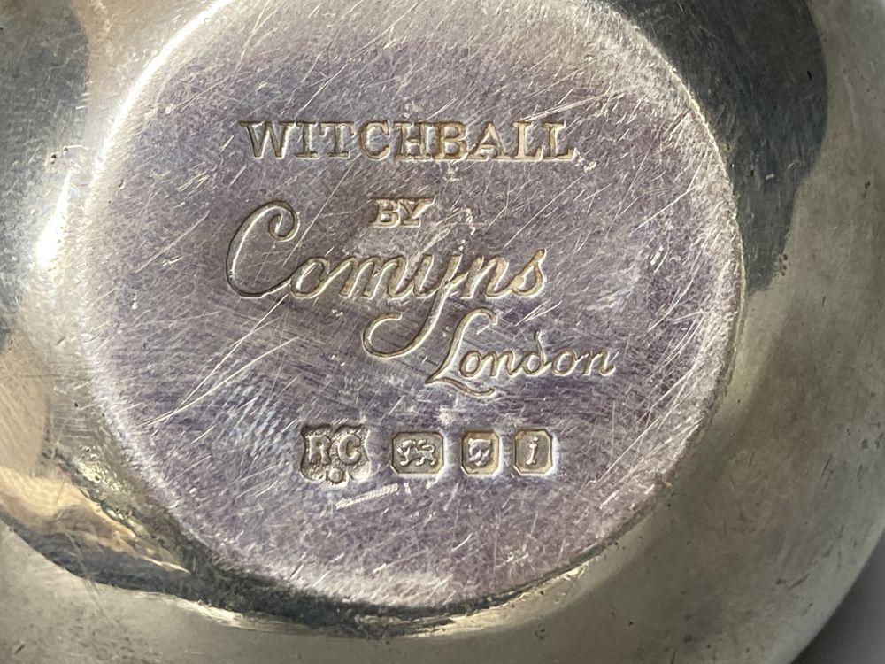A 1960s silver Witchball lighter by William Comyns & Sons Ltd, London, 1964, height 77mm.